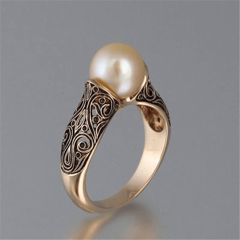 Bague rétro avec perle en or
