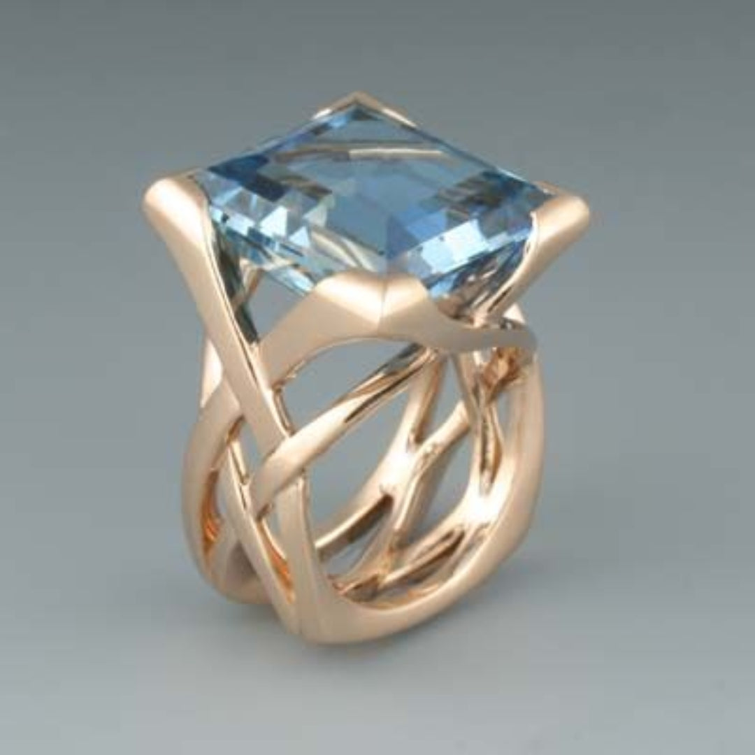 Bague vintage à brillants bleus en or rose