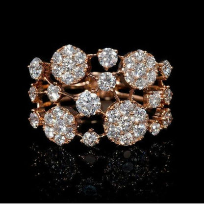 Bague antique en or rose avec pierres brillantes