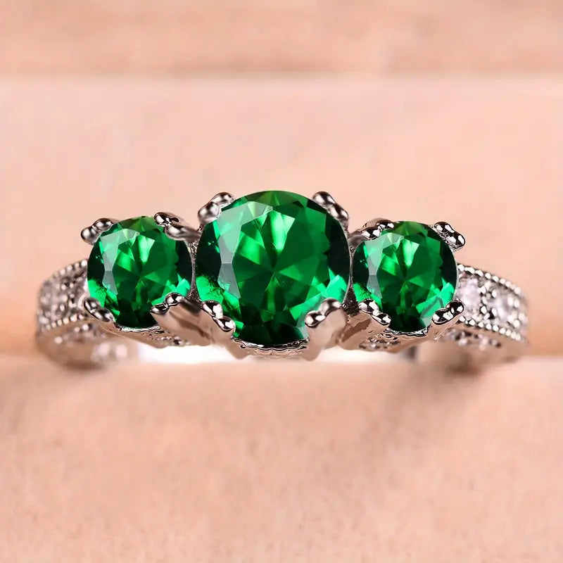 Bague avec 3 pierres d'émeraude en or