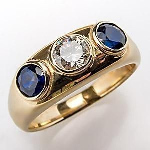 Bague à brillants et cristal bleu en or