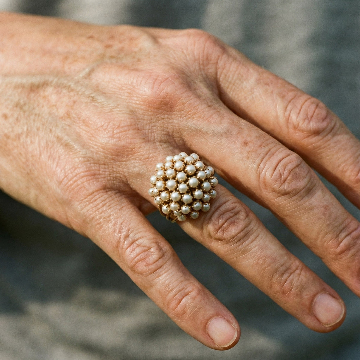 Bague avec ornements en perles en or