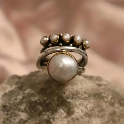 Bague rétro avec couronne en argent et perles