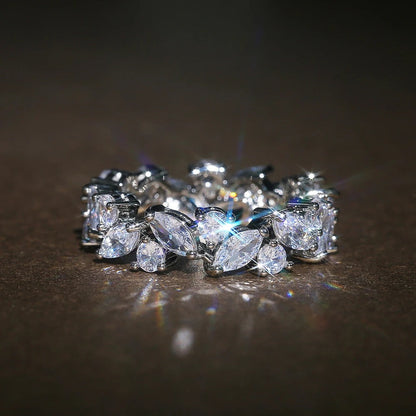 Bague rétro avec diamants ronds et marqués