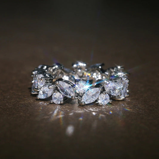 Bague rétro avec diamants ronds et marqués