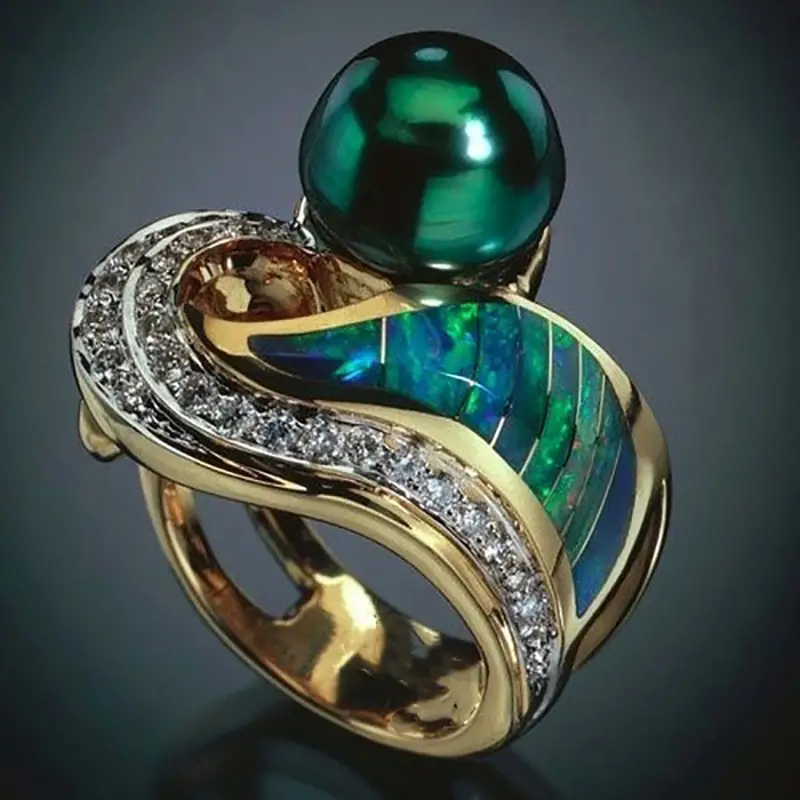 Bague rétro à brillants verts en or
