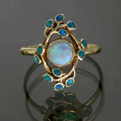 Bague rétro bleue avec cristaux et opale