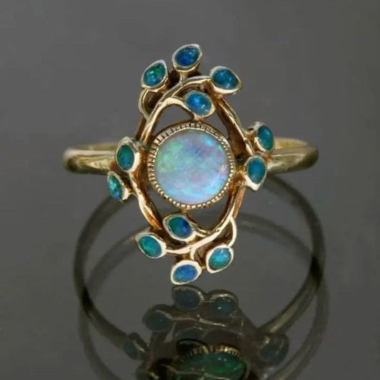 Bague rétro bleue avec cristaux et opale