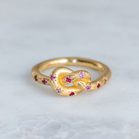 Bague rétro rose avec nœud céleste doré