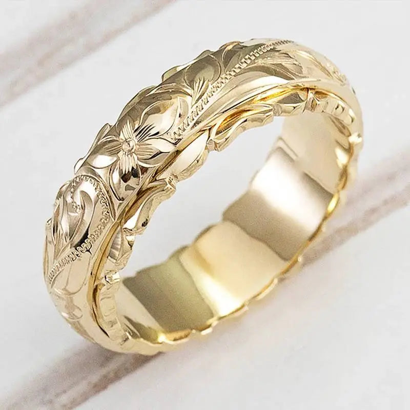 Bague vintage dorée avec fleur