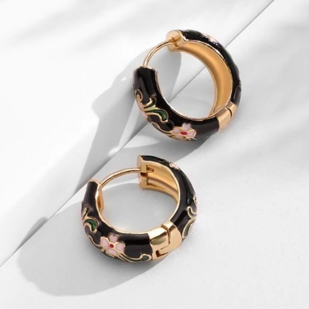 Bijoux fleurs noir luxe en or