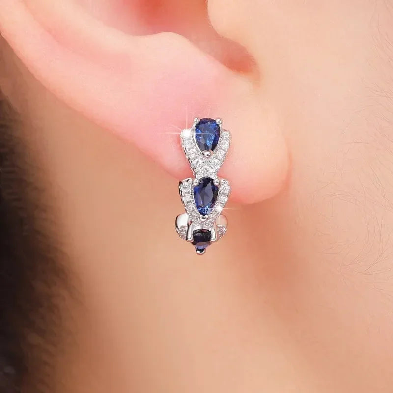 Boucles d'oreilles couronne Royale saphir en or blanc
