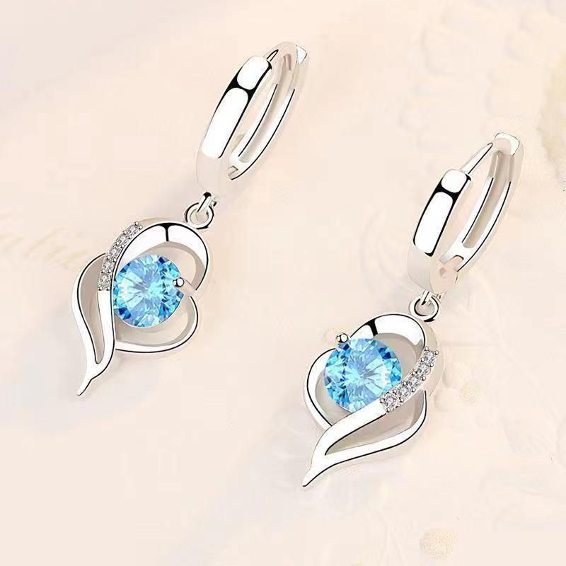 Boucles d'oreilles Éclipse goutte de cœur en or blanc
