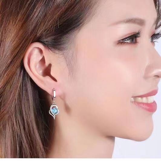 Boucles d'oreilles Éclipse goutte de cœur en or blanc