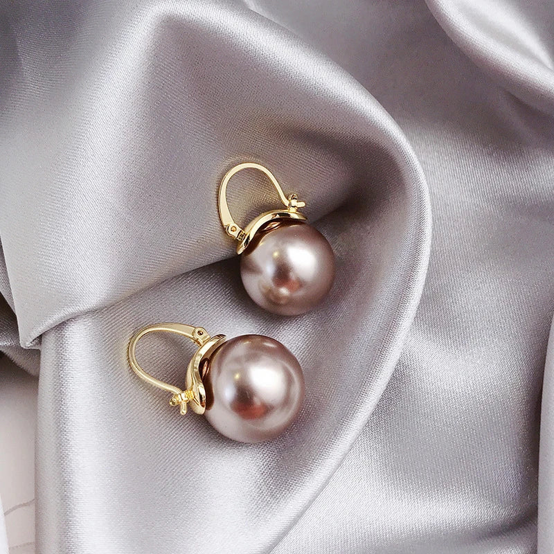 Boucles d'oreilles Fette avec des marguerites en or