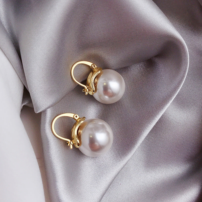 Boucles d'oreilles Fette avec des marguerites en or