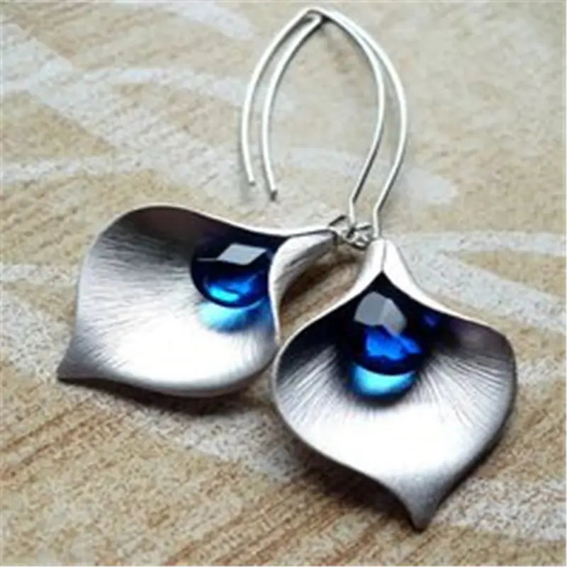 Boucles d'oreilles lotus en or blanc