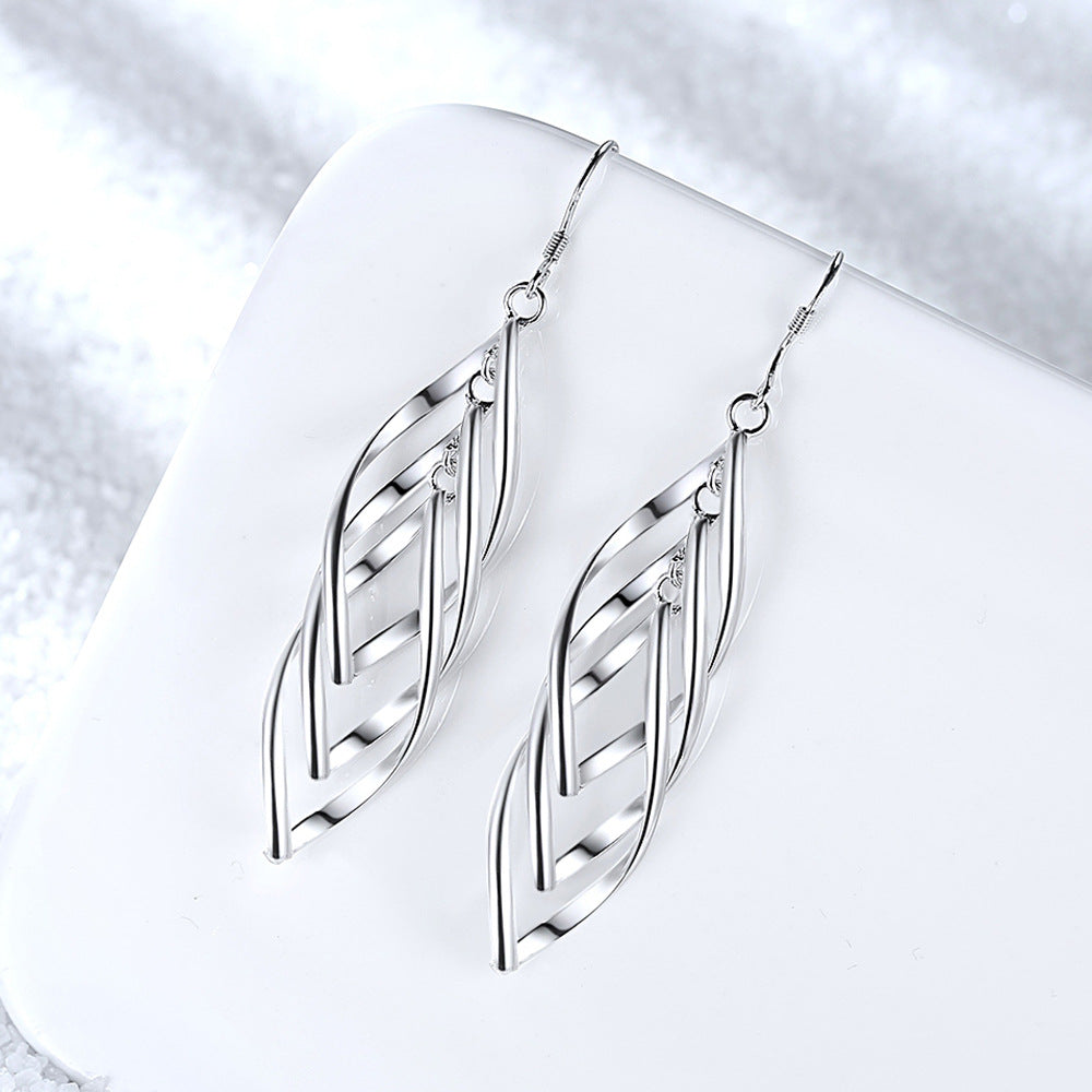 Boucles d'oreilles vague tressée Solenne en or blanc