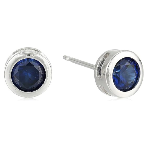 Boucles d'oreilles à clou avec sertissage en saphir en or blanc