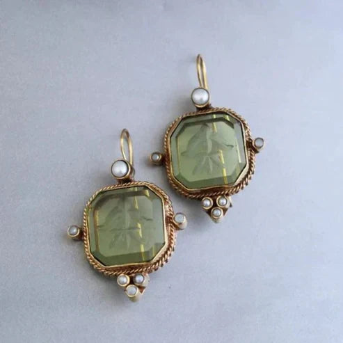 Boucles d'oreilles avec cristal vert en or