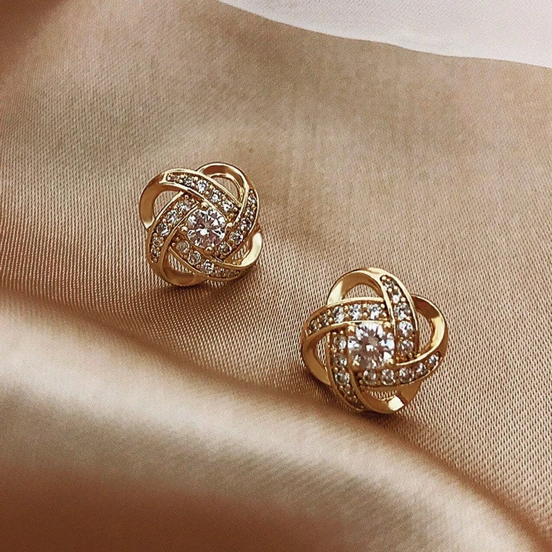 Boucles d'oreilles avec des billes brillantes en or