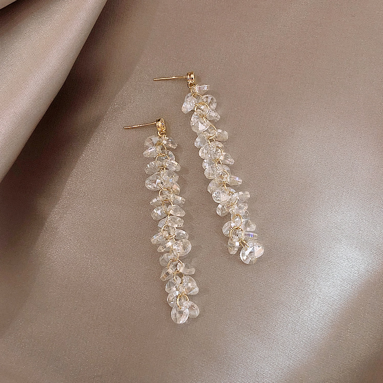 Boucles d'oreilles avec pendentif à brillants en or