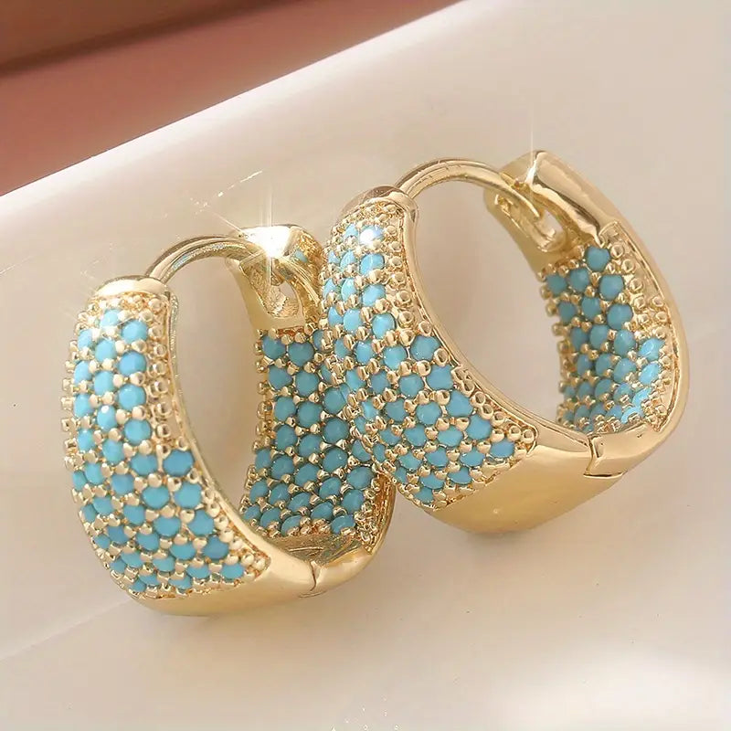 Boucles d'oreilles créoles en perles turquoise et ton en or