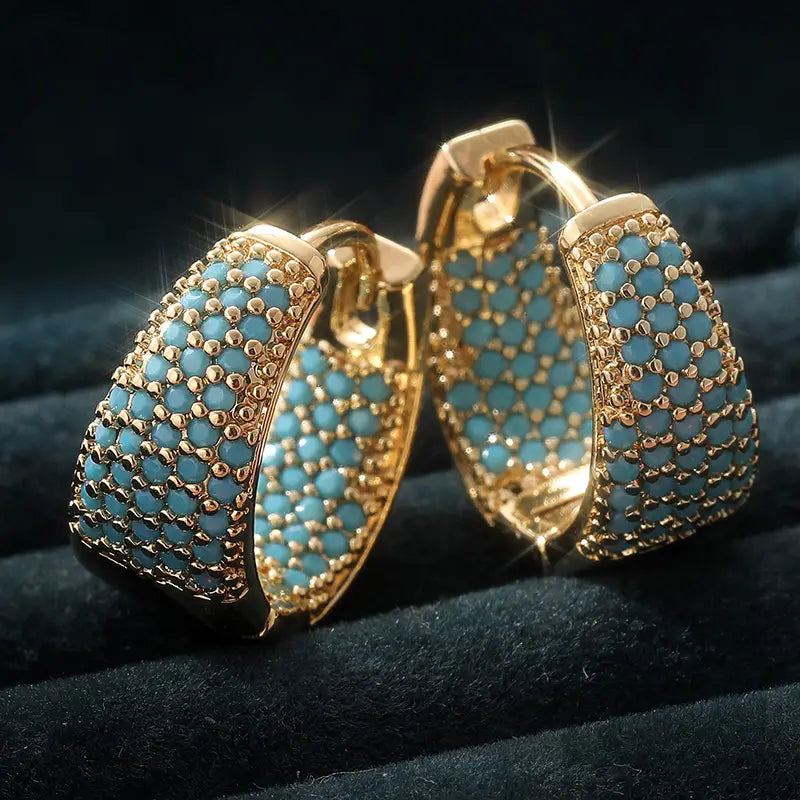 Boucles d'oreilles créoles en perles turquoise et ton en or
