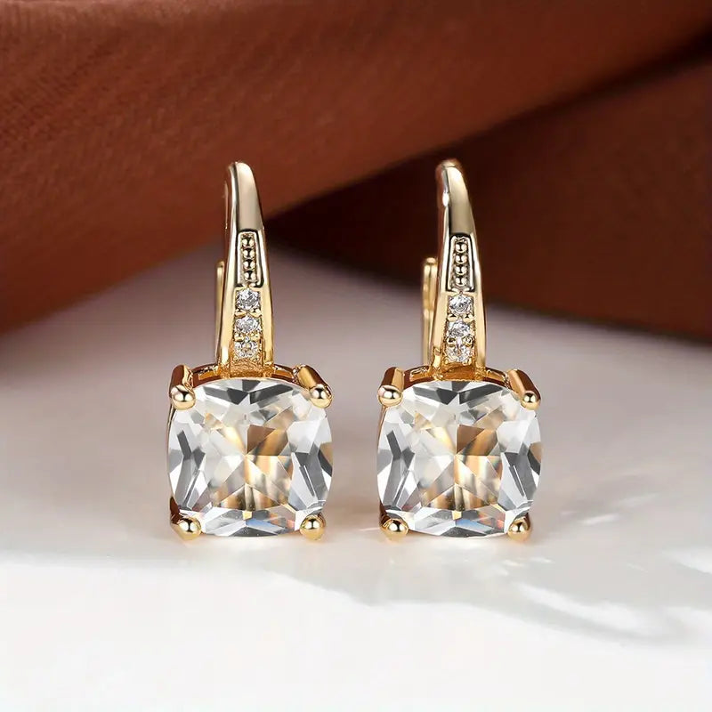 Boucles d'oreilles créoles en pierre de saphir mystique en or