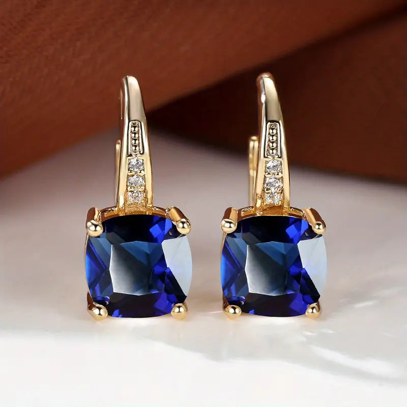 Boucles d'oreilles créoles en pierre de saphir mystique en or