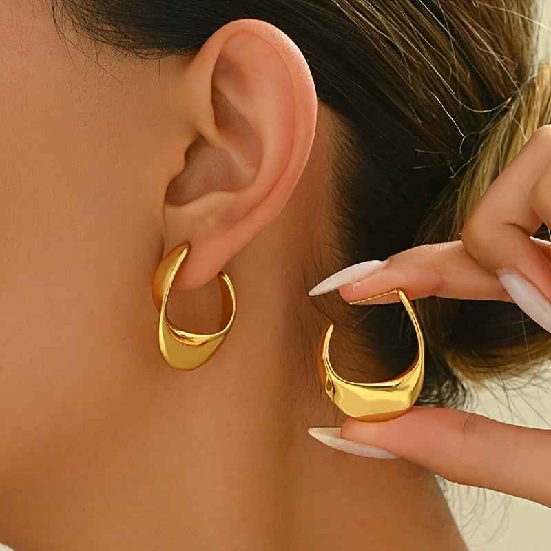 Boucles d'oreilles créoles sculptées en croissant en or