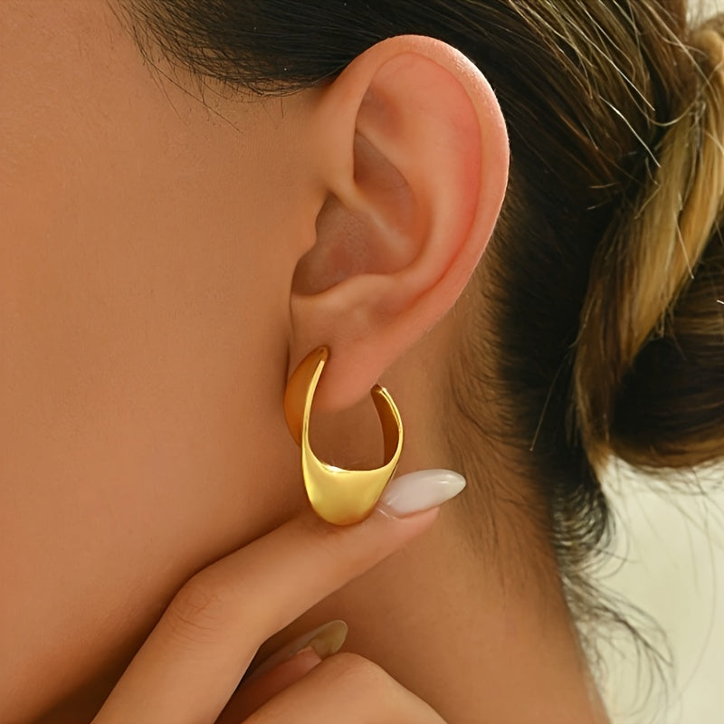 Boucles d'oreilles créoles sculptées en croissant en or