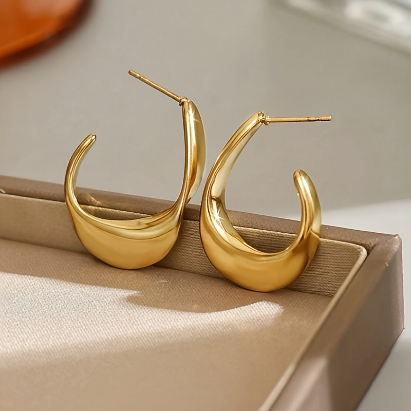 Boucles d'oreilles créoles sculptées en croissant en or