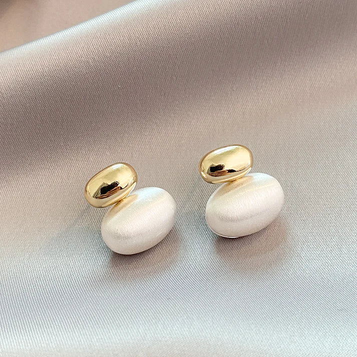 Boucles d'oreilles avec perle ovale en or