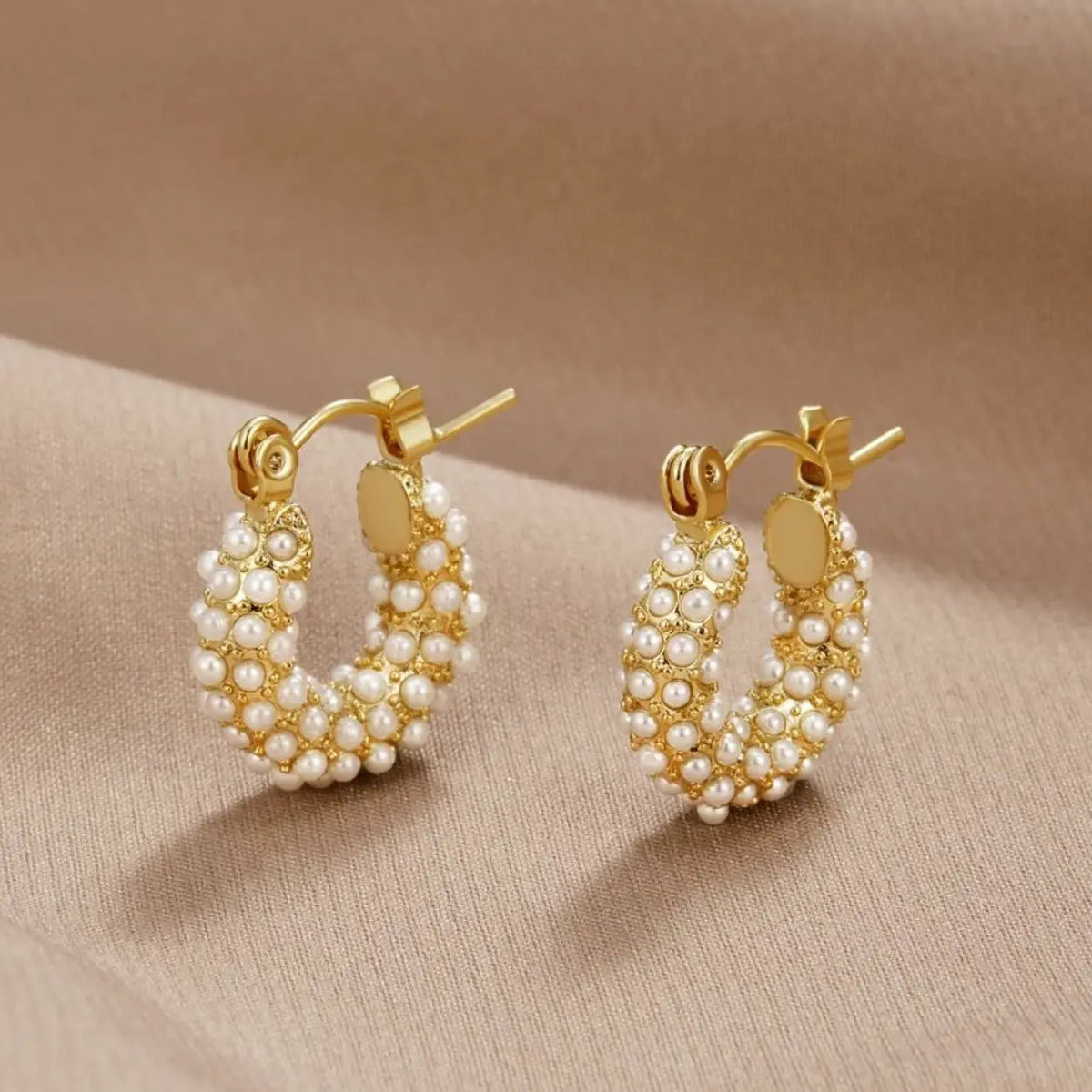 Boucles d'oreilles avec perles en or