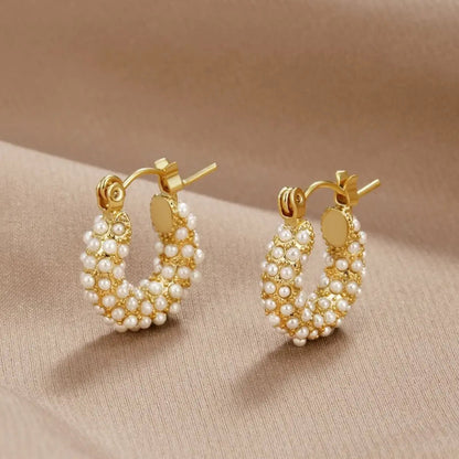 Boucles d'oreilles dorées avec perles