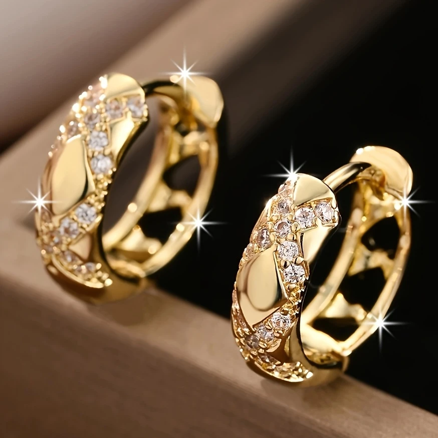 Boucles d'oreilles pendantes avec ouverture et éclat en or