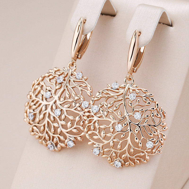 Boucles d'oreilles élégantes avec barres rondes et brillants en or