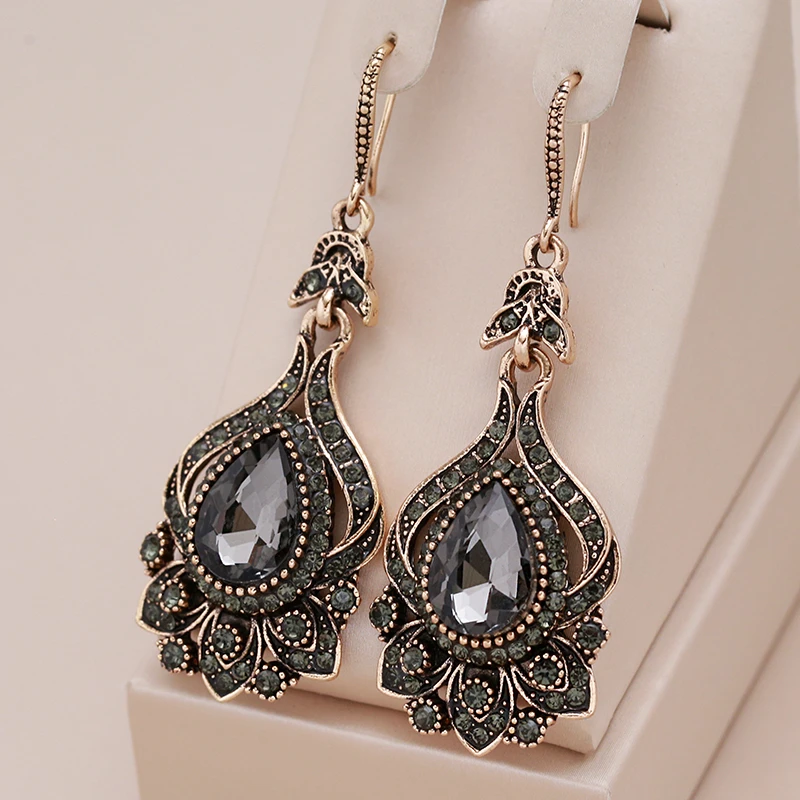 Boucles d'oreilles élégantes en cristal noir mandala en or