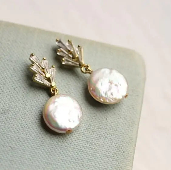 Boucles d'oreilles élégantes en perles baroques en or