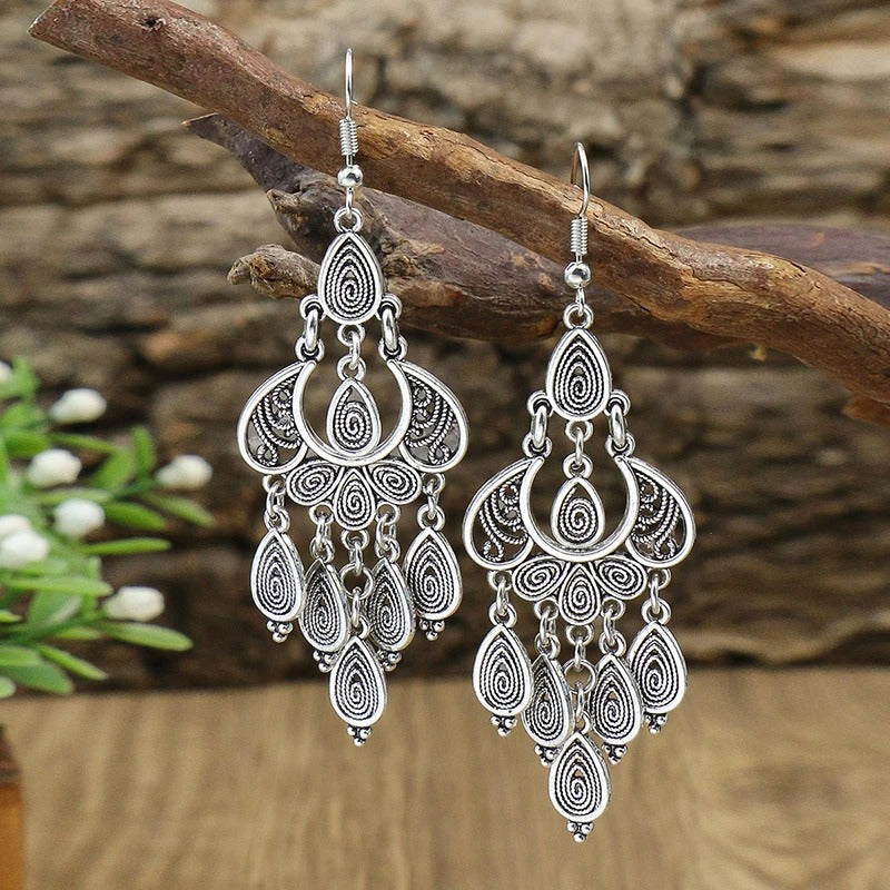 Boucles d'oreilles antique avec pendentif en or blanc