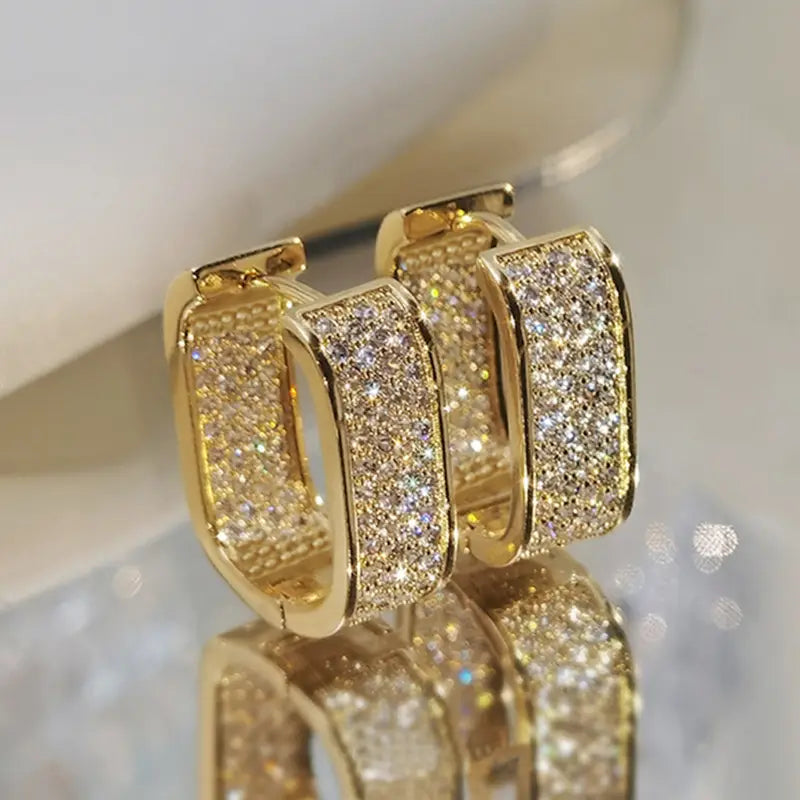 Boucles d'oreilles en cristal luxueuses en or