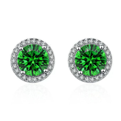 Boucles d'oreilles en émeraudes et diamants