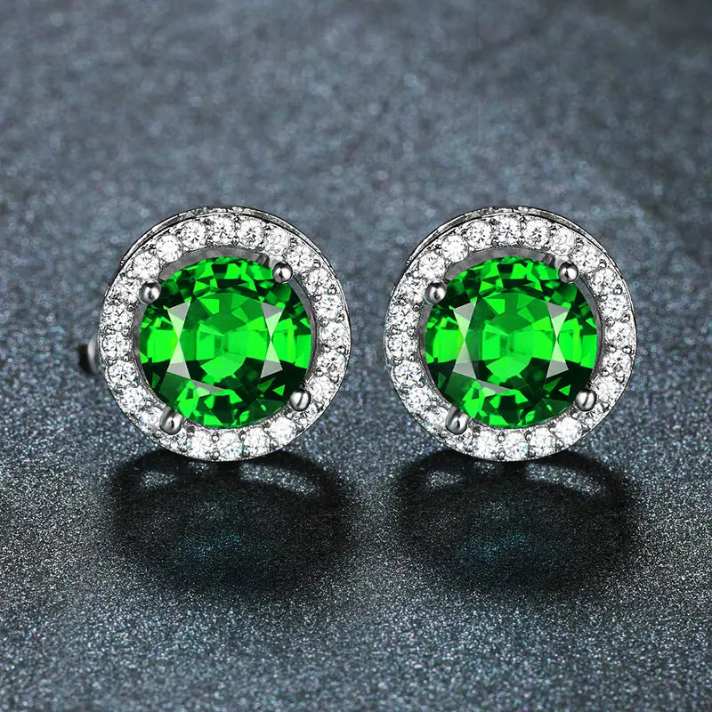 Boucles d'oreilles en émeraudes et diamants en or