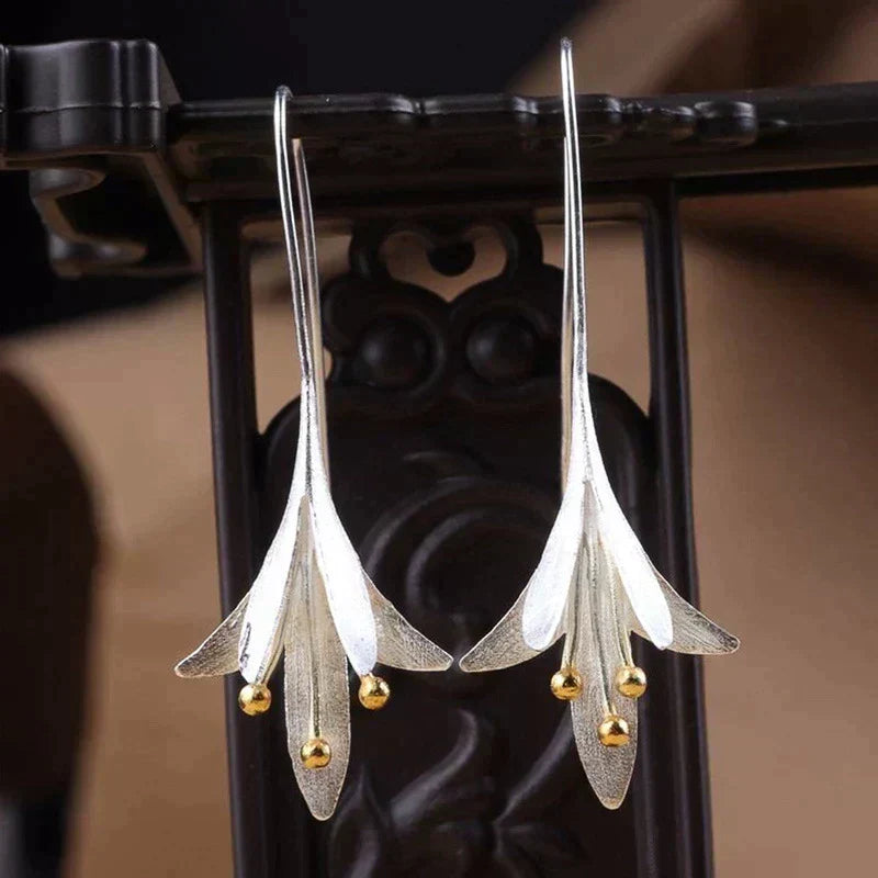 Boucles d'oreilles en fleurs en or blanc
