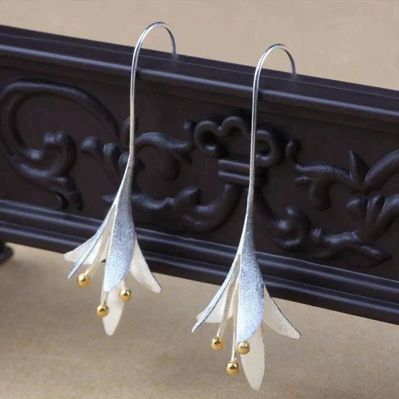 Boucles d'oreilles en fleurs en or blanc