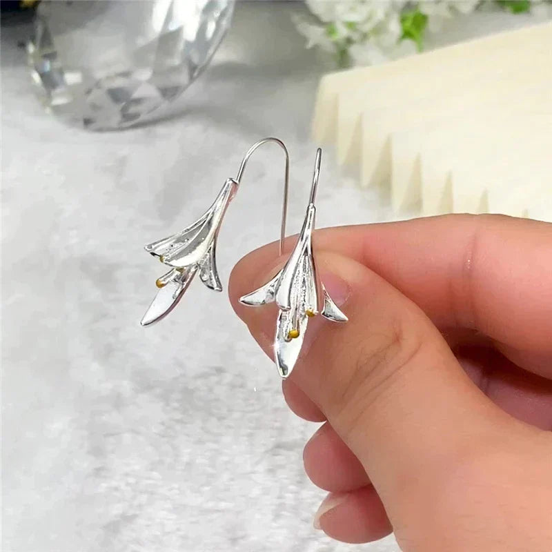 Boucles d'oreilles en fleurs en or blanc