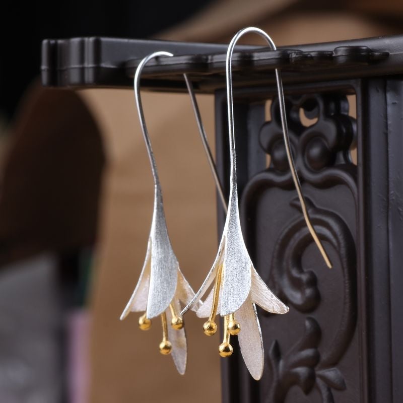 Boucles d'oreilles en fleurs en or blanc