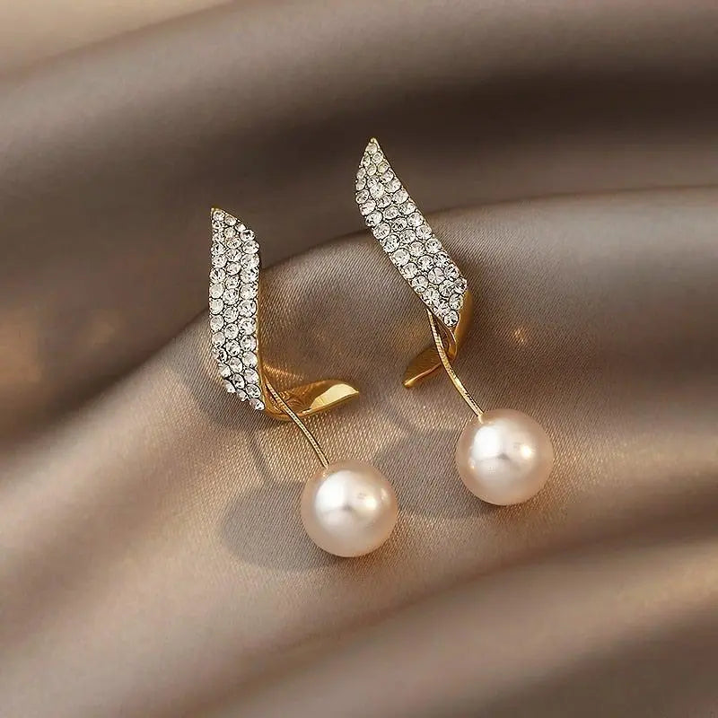 Boucles d'oreilles avec perles en or
