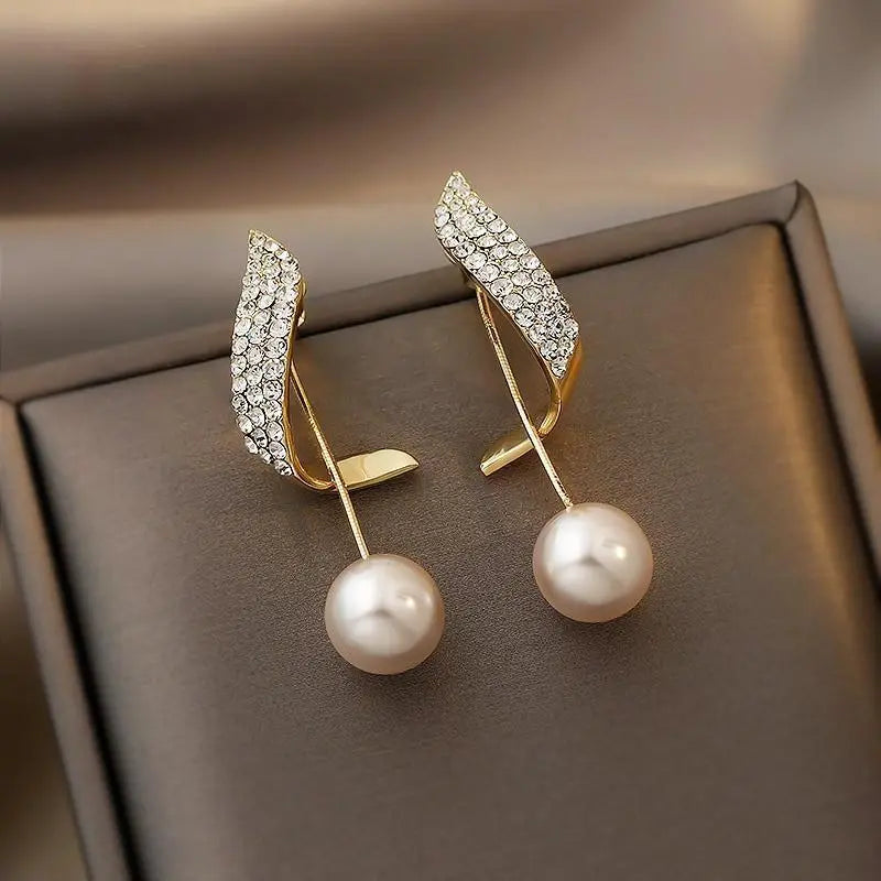 Boucles d'oreilles avec perles en or